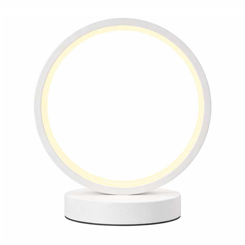 Modern white LED ring table lamp on a white background