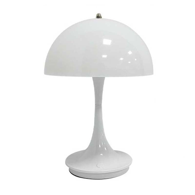 White table lamp with a dome-shaped shade on a white background