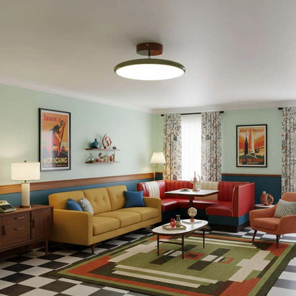 Adjustable Ceiling Light Pivot in Living Room with Yellow Sofa, Red Sofa, and Colorful Rug.