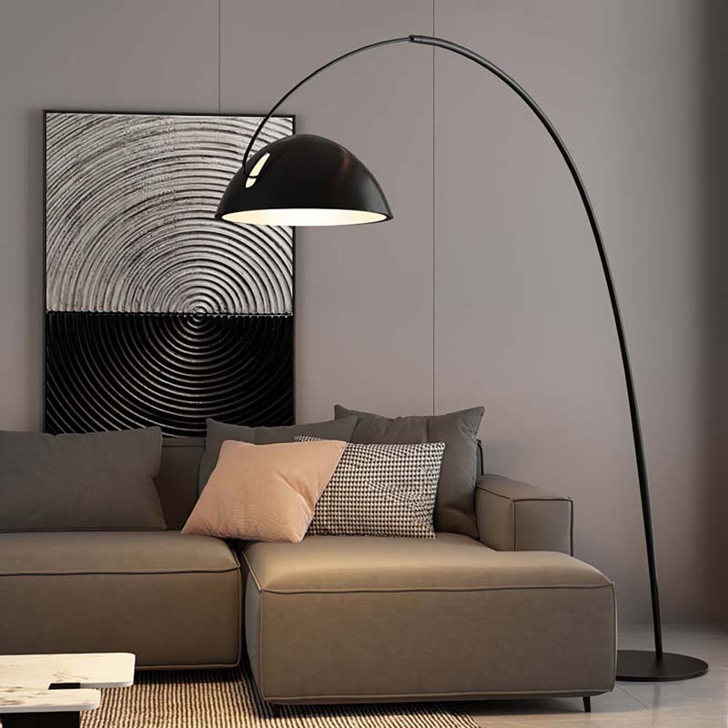 Arc floor lamp Bowl beside a sofa in a modern interior