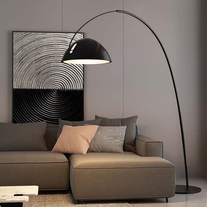 Arc floor lamp Bowl beside a sofa in a modern interior