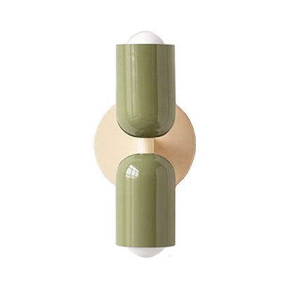 Decorative wall sconce with green and beige colors on a white background