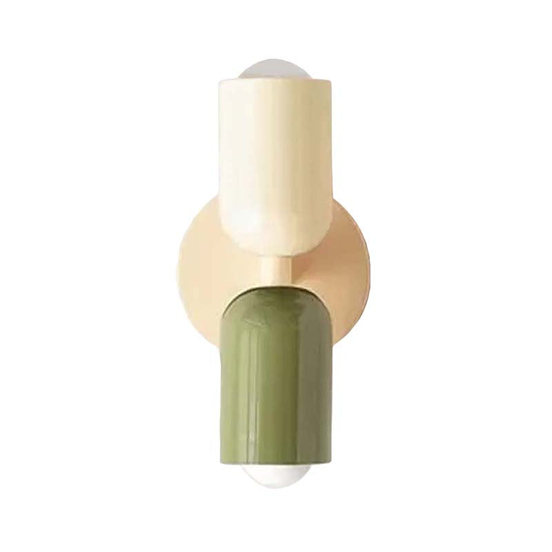 Wall sconce with beige and green design on a white background