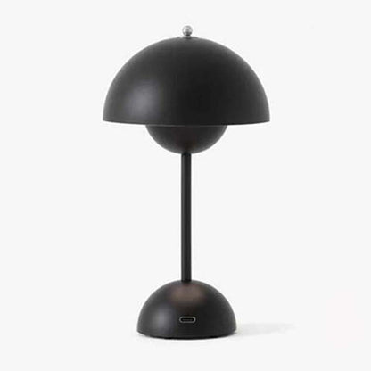 Black table lamp with a unique design on a white background