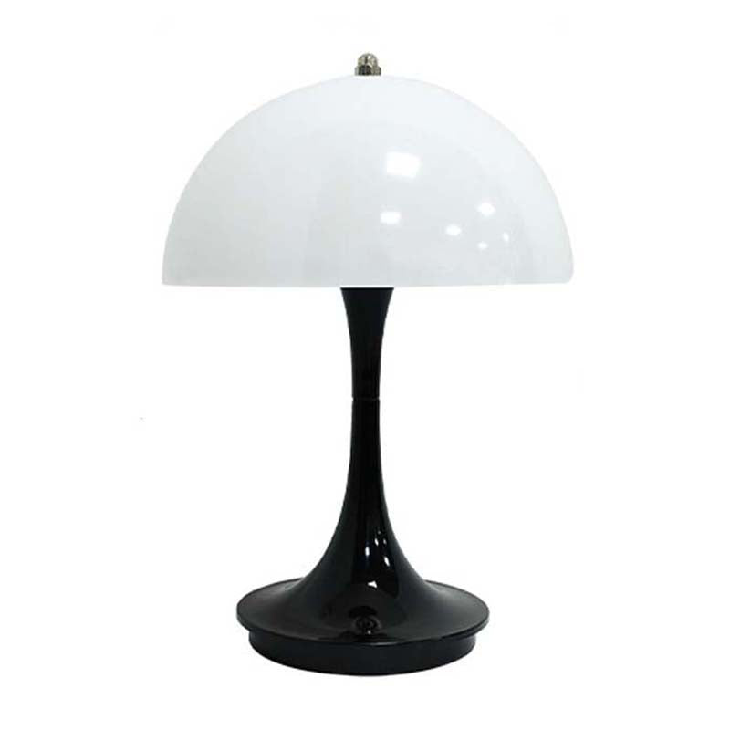 Table lamp with white shade and black base on a white background