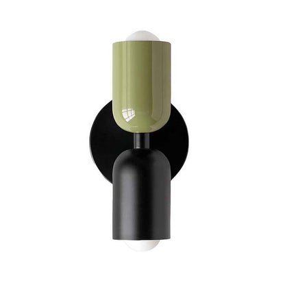 Wall-mounted lamp with green and black design on a white background