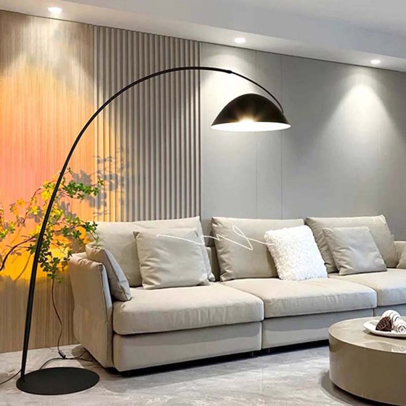 Black Bowl floor lamp next to a sofa