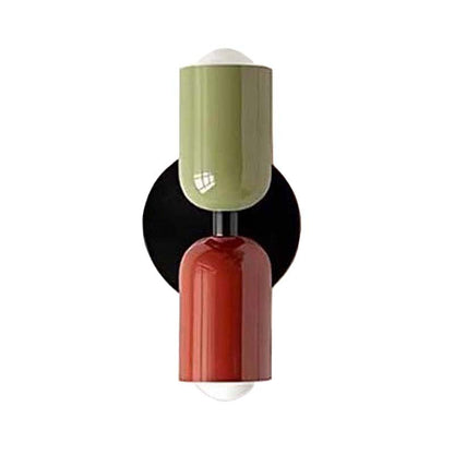 Modern wall lamp with green and red design on a white background