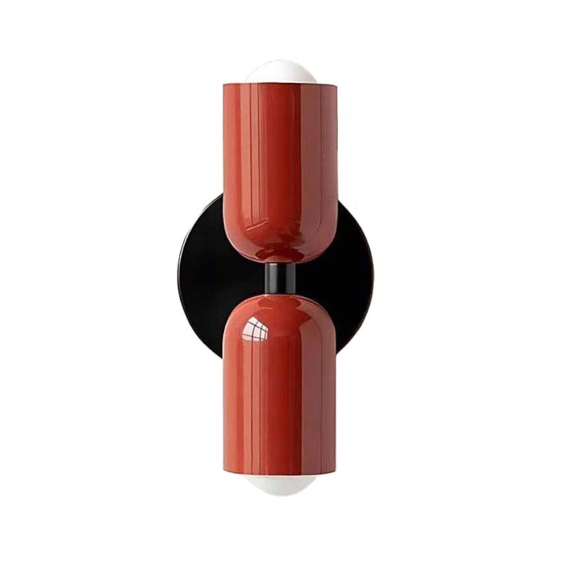 Modern wall sconce with red and black design on a white background