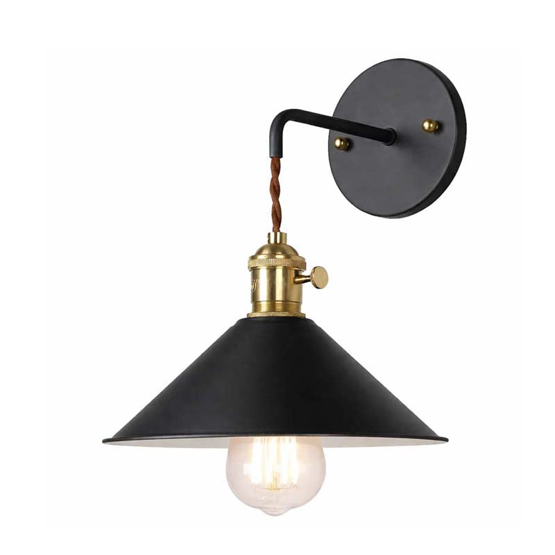 Black wall-mounted lamp with brass fixture on a white background