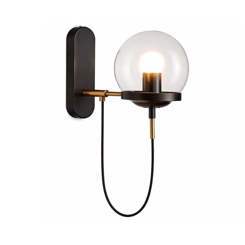 Wall-mounted light fixture with glass globe and black finish on a white background