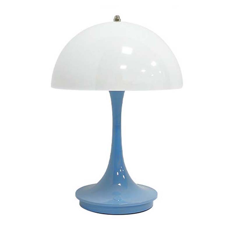 Table lamp with white shade and blue base on a white background