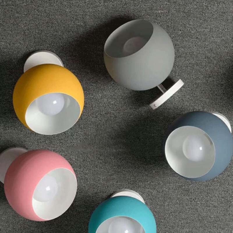Colorful spherical lamps on a gray surface