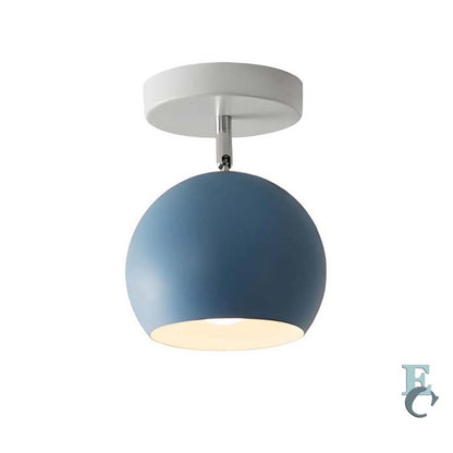 Ceiling light fixture with blue shade and white base on a white background