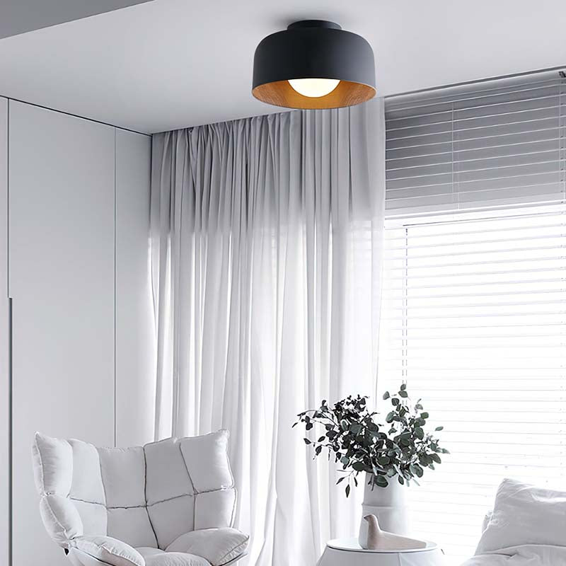 Ceiling Light Minimal in a modern interior with a white armchair and white curtains.