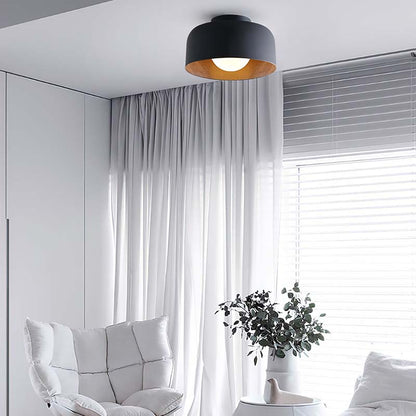 Ceiling Light Minimal in a modern interior with a white armchair and white curtains.