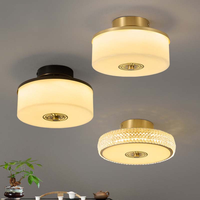 Three ceiling lights with different designs on a gray background