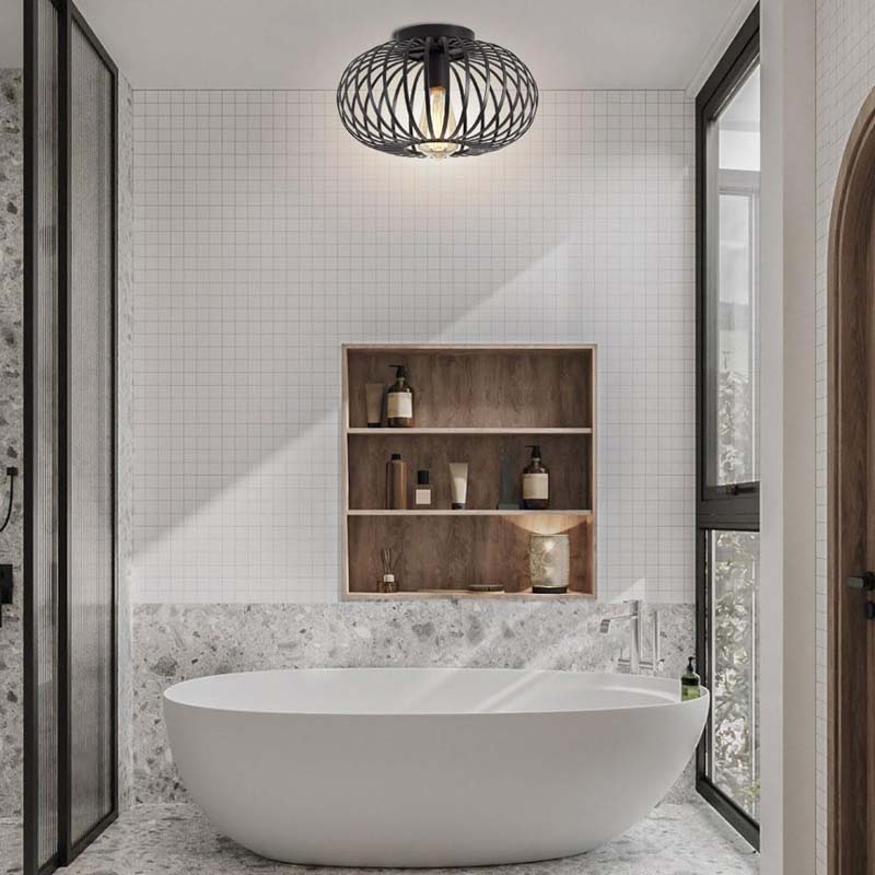 Ceiling light in a bright bathroom above the bathtub