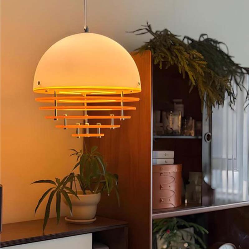 Designer sunset pendant light in evening interior