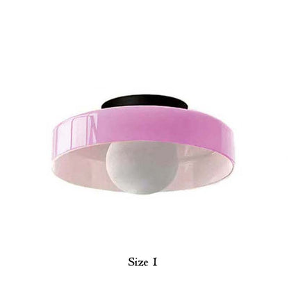 Pink ceiling light fixture on a white background