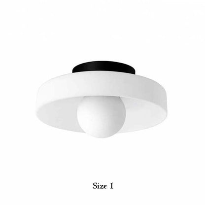 Ceiling light fixture with white shade and black fixture on a white background