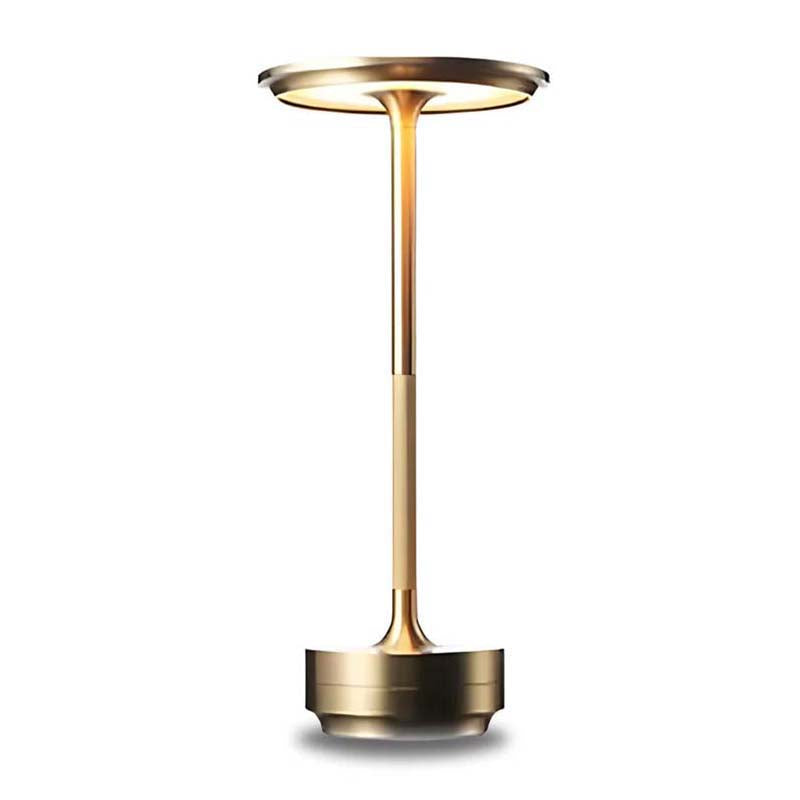 Golden table lamp on white background