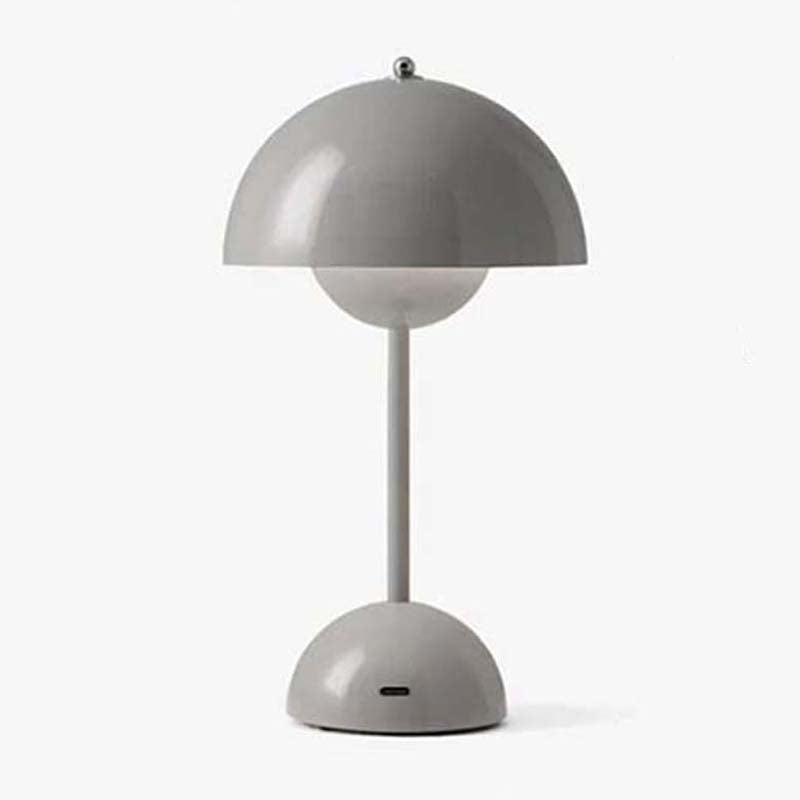 Gray table lamp with a unique design on a white background
