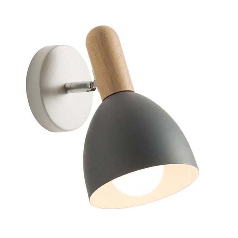 Wall-mounted lamp with gray shade and wooden arm on a white 