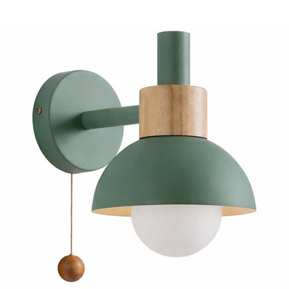 Green wall lamp with wooden accents on a white background