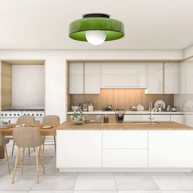 Modern kitchen with a green ceiling light fixture.