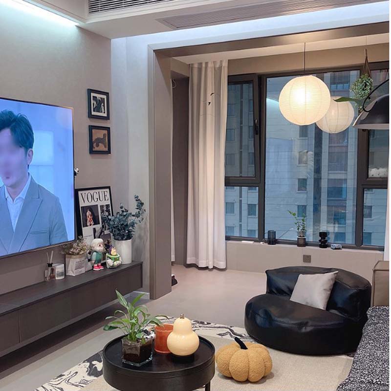 Hanging paper lanterns in living room interior