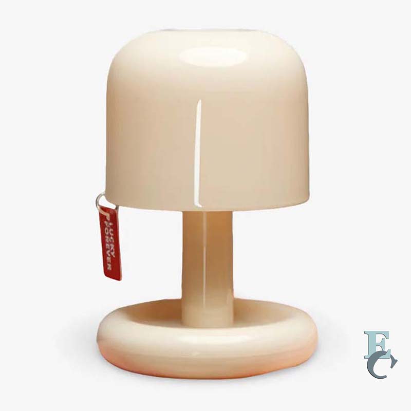 Beige lamp with a red tag on a white background