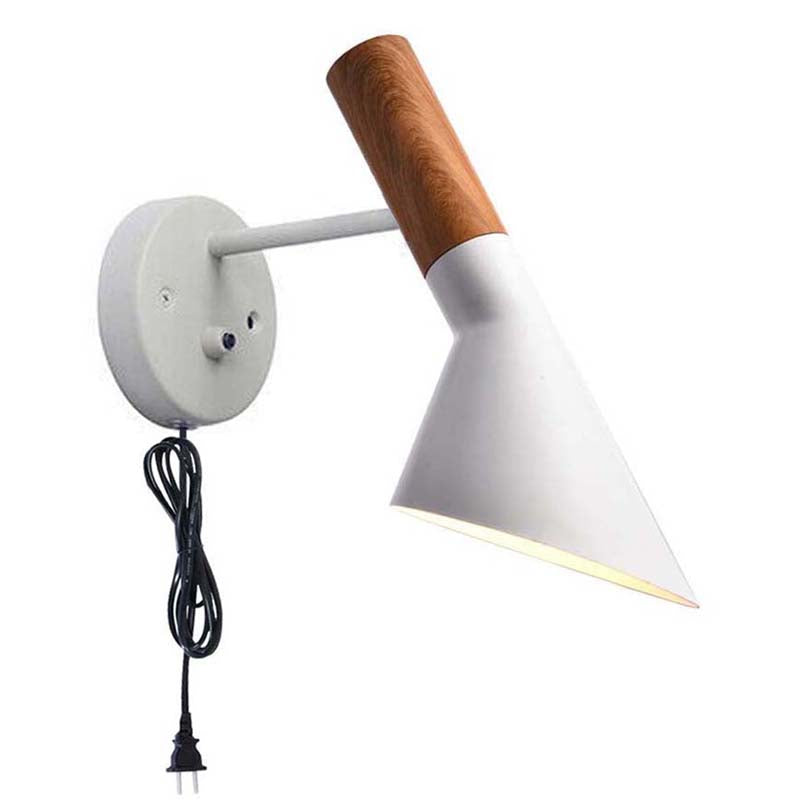 Wall-mounted lamp with wooden accent and white shade on a white background