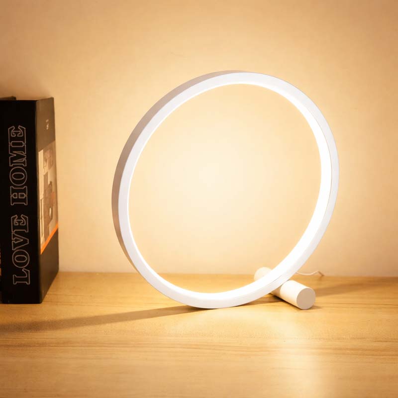 Circular light on a wooden surface with a warm glow