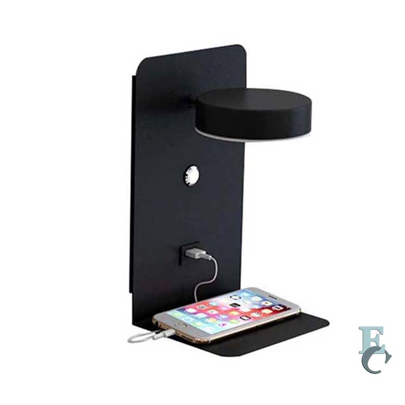 Black wall-mounted charging station with a smartphone on a white background