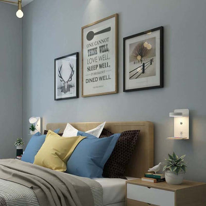 Modern bedroom with a bed, pillows, and wall art.