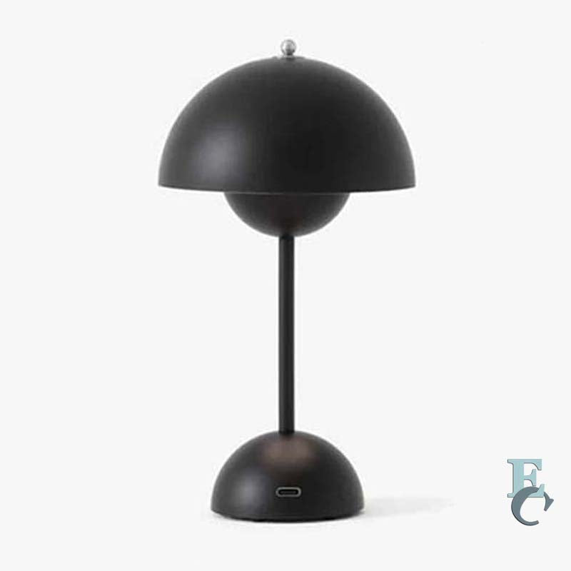 Black table lamp with a unique design on a white background