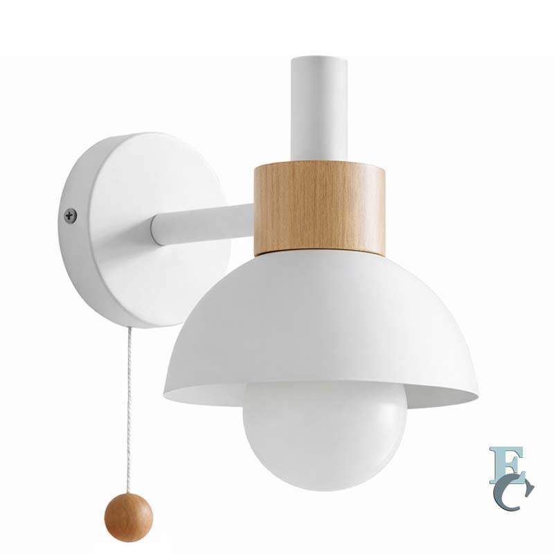 Wall-mounted light fixture with white shade and wooden accents on a white background