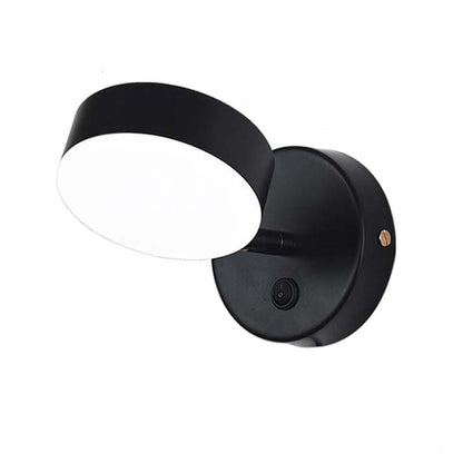 Black wall-mounted light fixture on a white background