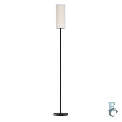 Floor lamp with a white shade on a white background