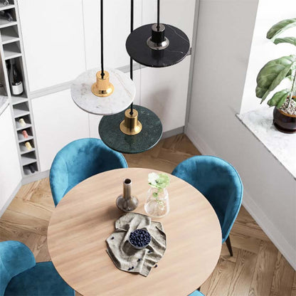 Modern Marble Pendant Light in a contemporary dining area with a round wooden table and blue chairs.