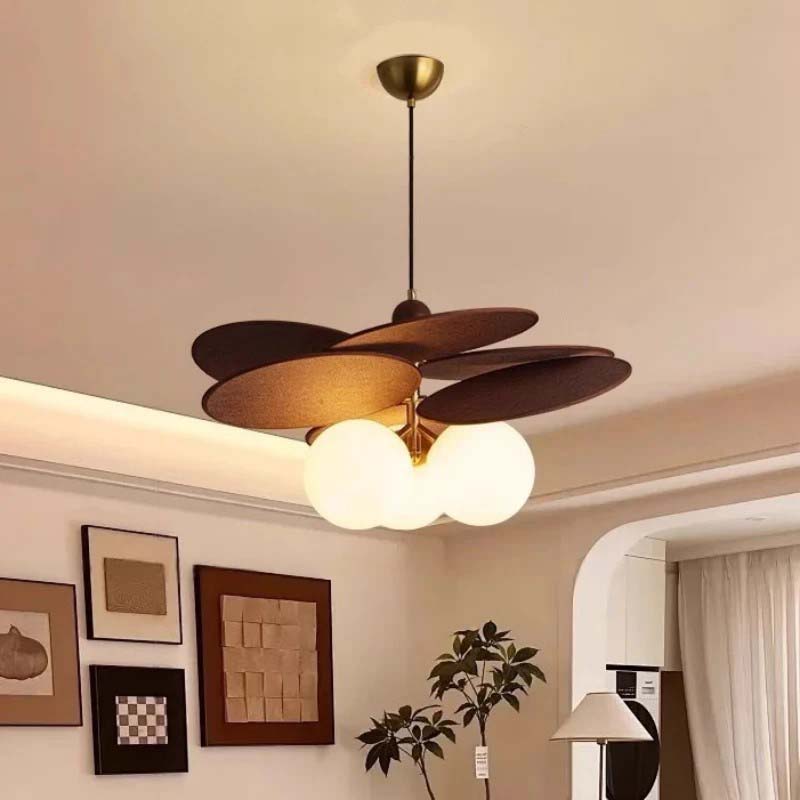 Modern ceiling pendant with wooden elements in a living room