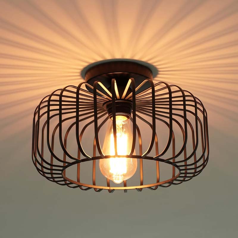 Modern pendant light with metal frame, close-up