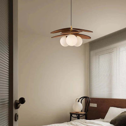 Modern wooden pendant light in bedroom interior