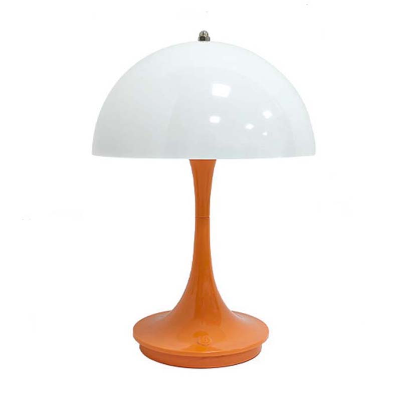 Table lamp with white shade and orange base on a white background