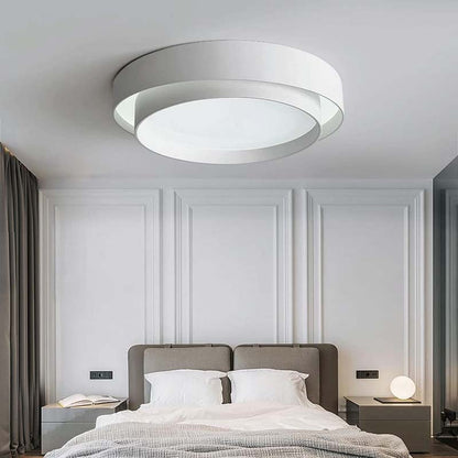 Ceiling light fixture in a modern bedroom setting