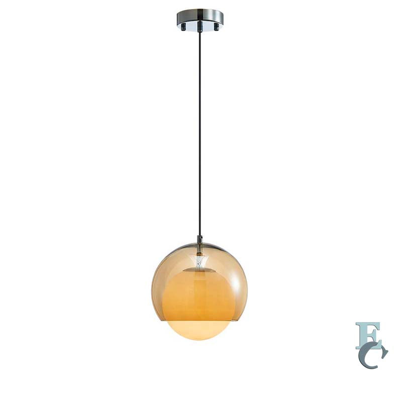 Pendant light with amber glass shade on a white background