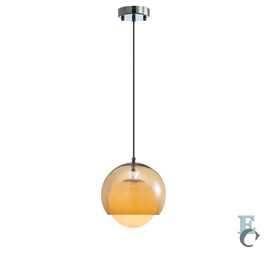 Pendant light with amber glass shade on a white background