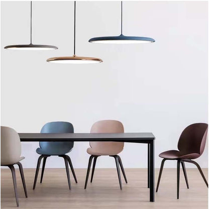 Contemporary Pendant Lamp Luna. Wini Macaron 4 Lunar lighting over a dining table with four chairs in a minimalist interior.