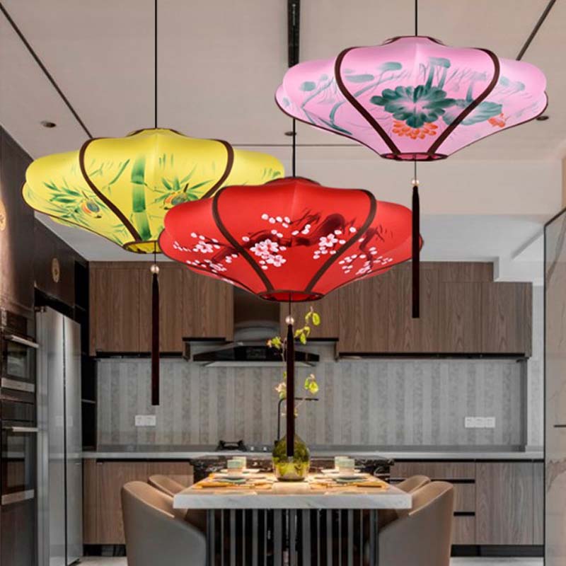 Decorative Chinese-style lanterns hanging in a modern kitchen.